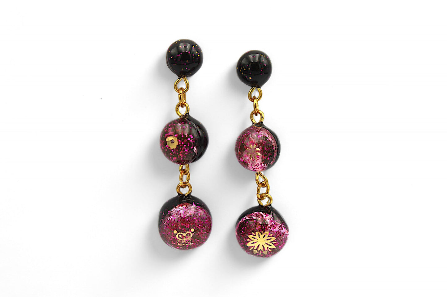 Sphère noire et paillettes