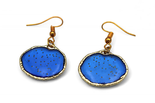 Cercle bleu et billes dorées