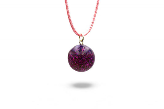 Sphère violette et paillettes